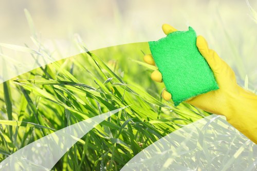 Professional carpet cleaners restoring a living room carpet