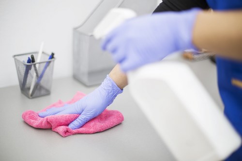 Office cleaning team working in a Hirecarpet business reception area