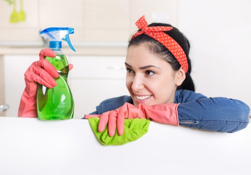 Carpet cleaning technician treating high-traffic flooring area