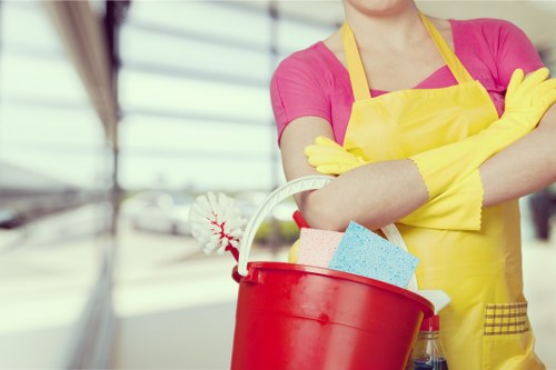 Local carpet cleaning service treating stained carpet in a furnished room